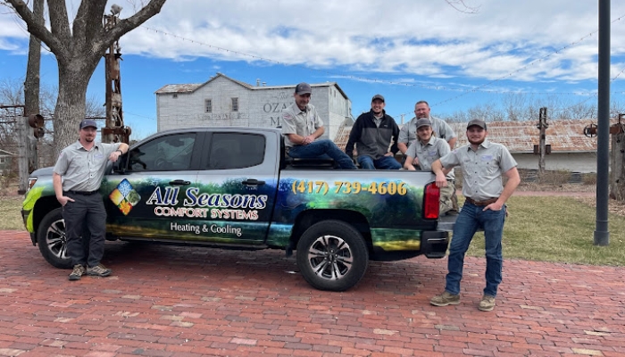 All Seasons Team With Truck At Ozark Mill